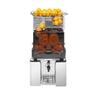Automatisk appelsinpresser - 70 kg - med automatisk frugttilførsel, 25 appelsiner/min, frugt Ø 60-80 mm, hopper ca. 40 appelsiner, affaldsbeholder 10 kg & sikkerhedsfunktion - rustfrit stål
